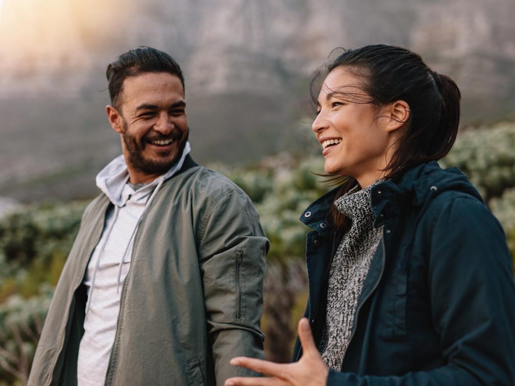 young couple hiking outdoors